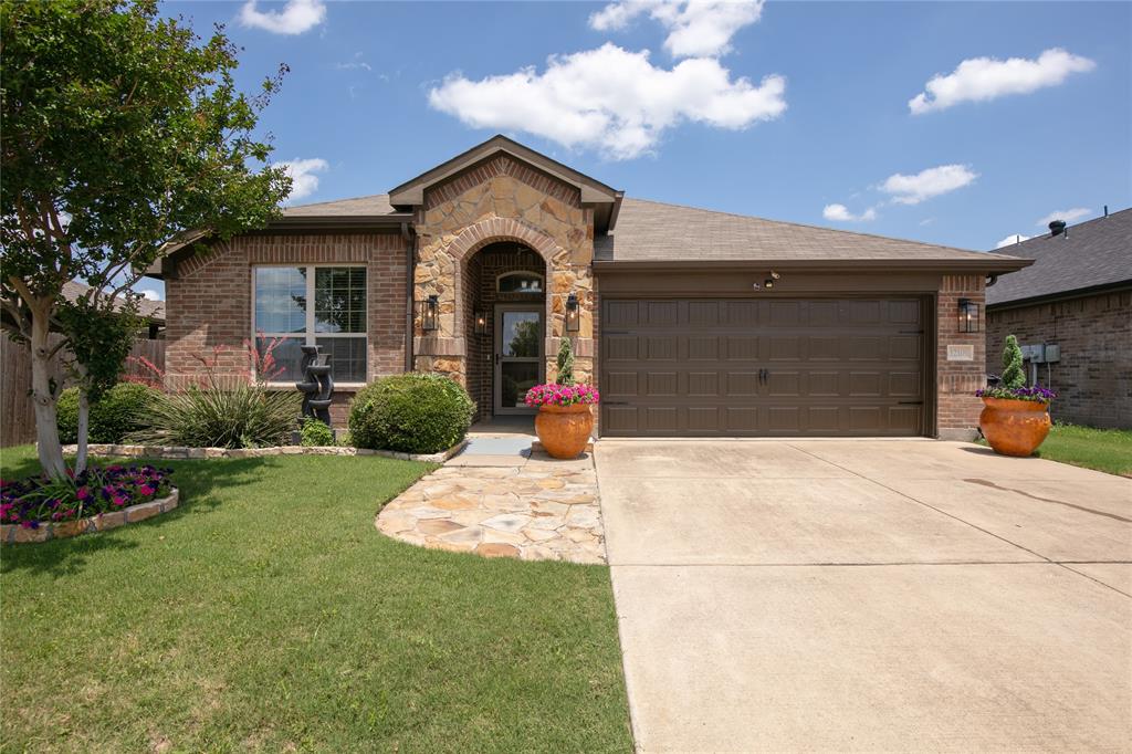 Fantastic 4 2 2 Great open floor plan wonderful for entertaining! Beautiful laminate wood, oversized master bedroom, huge walk in closet with custom Closets by Design!

Walk in Tile shower. Beautiful Stone and Brick exterior. Rounded corners, recessed lighting, Garage door openers, 2 exterior security cameras are staying in the front and back. All plug-in fireplaces on walls are staying, all TV's are staying, 10x12 storage shed, Garden fountain and planters in front are staying. Window treatments.