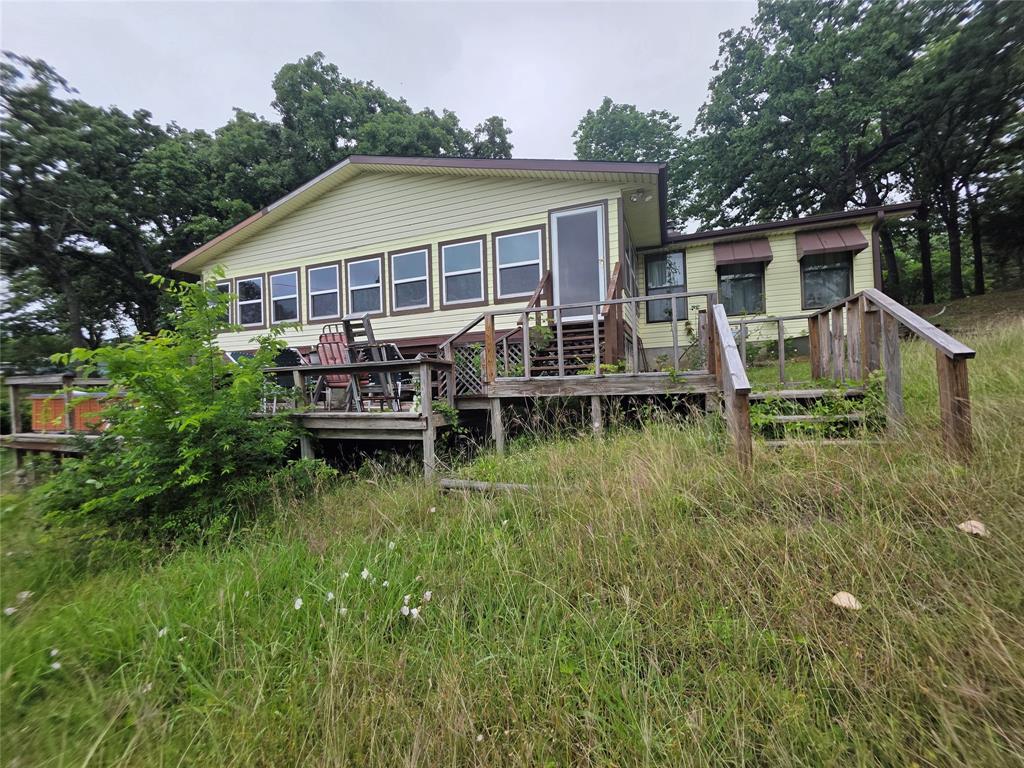 Lakefront living in Tool, TX! This charming 3-bedroom, 2-bath home offers 1,456 sqft of comfortable living space plus an additional 432 sqft den (12x36), providing extra room for relaxation, entertaining, or a flexible bonus area. Situated on a spacious 0.76-acre lot, the property offers stunning water views and direct lakefront access, perfect for enjoying peaceful mornings and scenic sunsets. Ideal as a full-time residence, weekend getaway, or investment opportunity, this home combines space, location, and lake lifestyle all in one.