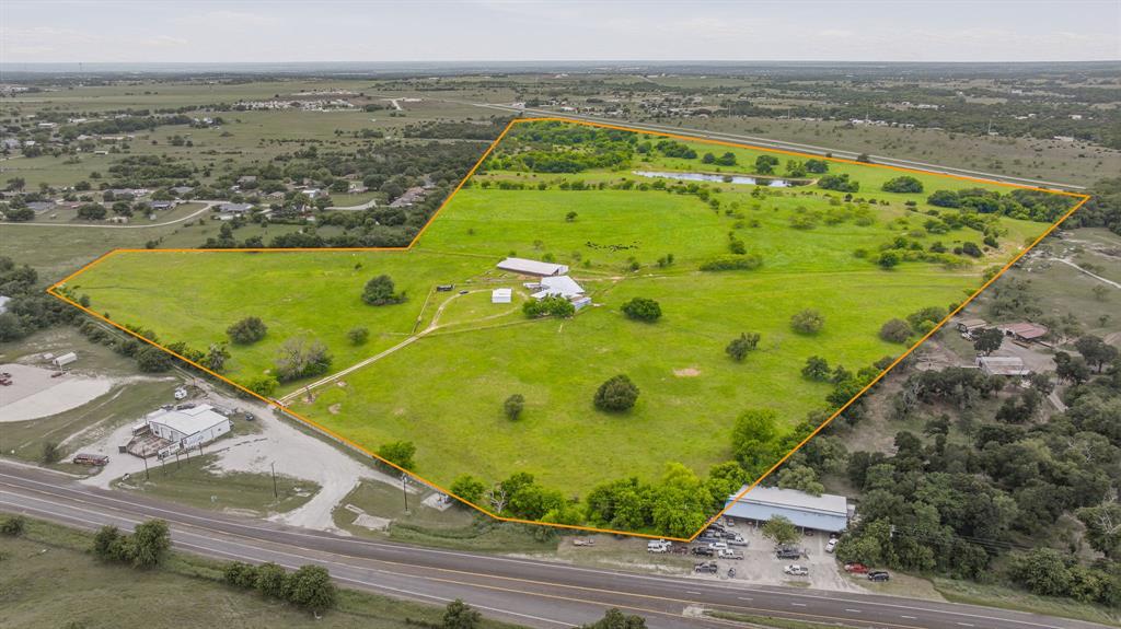 DO NOT WAIT!  Here is 108.91 acres of ranch land located just outside the city limits of Dublin, Texas, with a small portion being inside the city limits, giving you access to city water.  This land is peppered with oaks and an amazing scenic view!  Come build your dream home and bring your animals, as this property would be perfect place for your ranch. Located only minutes from downtown Dublin and 10 miles from Stephenville city limits, possibilities are endless.  Currently, owner is runnig a small herd of cattle on the property. There is also an old rock building-bunk house with a shower and bath, perfect for an over night retreat from the Big City, as this property would be an great recreational get-a-way, if your not ready to make the move to small town living!  There are already cattle pens, a loading chute, and hay barn in place along with a pond for a nutural water source for your animals. Come take a look today!