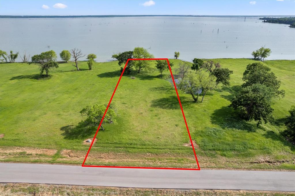 Embrace the lake life you've always dreamed of with this stunning 1.16 acre waterfront property in the Triangle Shores Subdivision. Offering an idyllic setting for recreation and relaxation, this lot provides direct access for boating, fishing, and enjoying the beauty of the lake. Build your custom home and create lasting memories in this established and desirable lakeside community.