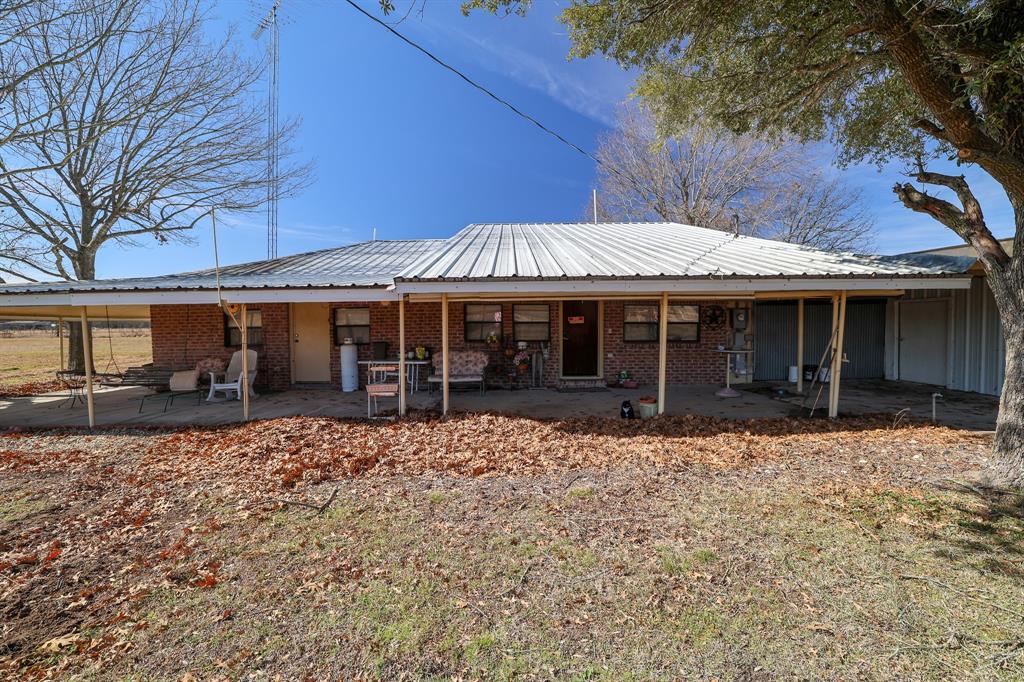Set on approximately 46.6 AG-exempt acres in Hunt County, 6482 County Road 4700 offers productive land with an established homesite just minutes from Commerce. The property has been actively used for hay production for several years, providing a strong agricultural use history and the benefit of reduced property taxes through its existing ag valuation. The acreage is level and usable and includes a pond that adds both functionality and visual appeal. The pond supports agricultural use and provides a natural water feature that enhances the overall setting of the property. The property includes a 2,110 square foot residence built in 1989, featuring a durable metal roof, concrete block foundation, central heat and air, and a large covered porch overlooking the surrounding land. Multiple outbuildings and covered structures provide ample space for equipment storage, hay operations, or livestock support. With county road frontage and a practical layout, the property offers a balance of accessibility and privacy. It is well suited for continued hay production, ranching, homesteading, or recreational use. Located within Commerce ISD, the property combines a quiet rural setting with convenient access to Texas A&M University-Commerce, local amenities, and regional routes connecting to Greenville, Sulphur Springs, and the broader Northeast Texas area. This property presents a compelling opportunity for buyers seeking AG-exempt acreage with proven productivity, a pond, and long-term land value in a desirable rural location.