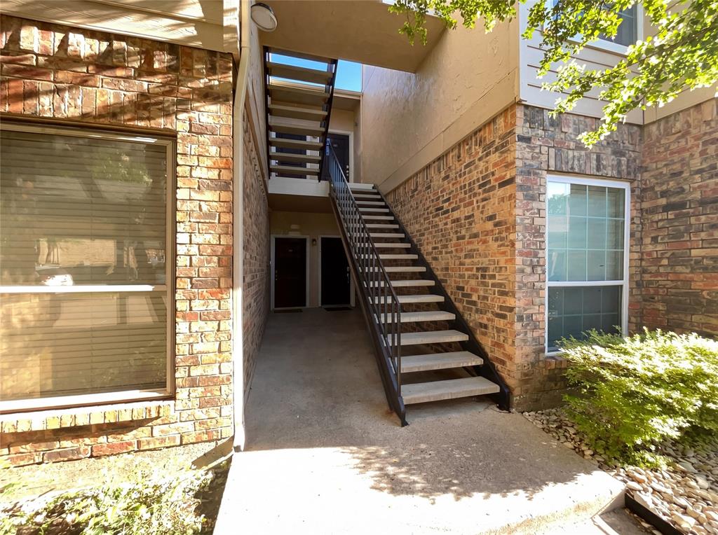 Great location in the heart of North Dallas! This beautifully updated, move-in ready two-story condo in Dallas offers a spacious and modern layout with stylish upgrades throughout. Freshly painted with new flooring, the home features a bright and open living area highlighted by a cozy corner fireplace and elegant French doors leading to a private balcony. The fully updated kitchen showcases new quartz countertops, updated lighting, and sleek finishes, while energy-efficient windows and new back doors enhance comfort and efficiency. Located in a quiet, well-maintained community, residents enjoy access to a pool and hot tub, plus the convenience of one covered parking space directly beneath the unit. HOA benefits include water, sewer, trash, hot water, water heater, landscaping, pool, roof, and foundation maintenance. Washer, dryer, and new stainless steel refrigerator are all included. Ideally situated near the Galleria Dallas, Addison’s vibrant entertainment district, and major highways including I-635 and the Dallas North Tollway, this home combines comfort, convenience, and exceptional value