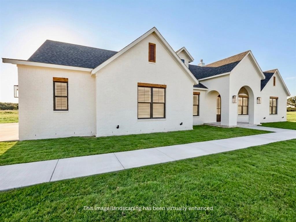 Built by Drew Lane Custom Homes, this luxury new construction home in Summit Ranch is set to be complete July 27, 2026. Sitting on two acres in the highly desired Aledo ISD, this home reflects intentional design throughout. Five bedrooms and three and a half bathrooms give you the flexibility to grow into the space as you see fit, whether that's a home office, guest suite, or entertainment & game room. Custom cabinetry runs throughout, and a hidden butler's pantry keeps entertaining easy without the clutter. Out back, a covered porch with a masonry, wood burning fireplace offers an easy spot for a quiet evening and enough room for a crowd when you need it.
A private water well, aerobic septic system, and attached three car garage round out the property, giving you the independence of country living. And with downtown Fort Worth just a short drive away, you get two acres of quiet without losing the convenience of the city.
This is exactly what home should feel like. Come see for yourself.
