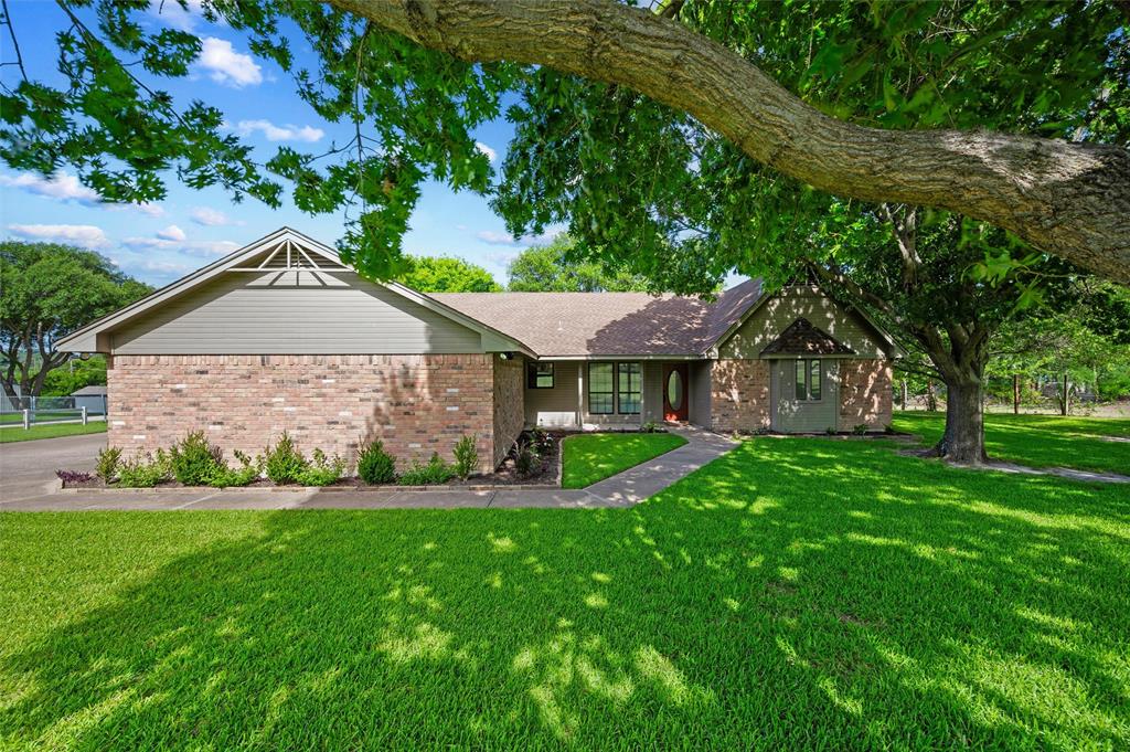 Located in the Tejas Trails neighborhood on the west side of Fort Worth, this charming property offers the perfect blend of space, comfort, and versatility. Known for its oversized lots of more than half an acre, Tejas Trails provides a spacious setting with room to enjoy the outdoors. 
This home features an oversized living room that's perfect for making it fit your layout creativity. A versatile bonus room offers endless possibilities as a home office, sunroom, playroom, hobby space, or additional living area to suit your needs. Outside, the expansive lot features plenty of trees for shade, creating a comfortable outdoor environment with ample space to relax, entertain, or garden. A workshop with electricity is ideal for projects, woodworking, or additional storage, while a separate storage shed provides convenient space for lawn equipment and outdoor tools. If you've been searching for a property with room to spread out, flexible living spaces, and the added benefits of a large lot, this home is a must-see. Conveniently located near shopping, dining, schools, and major highways, it offers the perfect combination of peaceful living and everyday convenience.