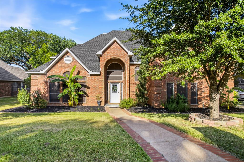 This lovely Arlington home, move-in ready; NEW ROOF updated bathrooms featuring quartz countertops, fresh interior paint, new HVAC. Martin HS, Arlington ISD, this home is spacious and stylishly updated situated on a rare 0.80-acre lot in a quiet, established cul-de-sac, with NO HOA. 3,700 square feet of living space, this unique two-story home offers an ideal layout with multiple living areas designed for comfort and functionality. Inside, you’re greeted by soaring ceilings, rich wood and tile flooring, natural light, floor-to-ceiling brick fireplace, built-in shelving, and a wall of windows overlooking the backyard. The formal dining room includes elegant built-in cabinetry and a buffet, perfect for entertaining or storing serve ware. The kitchen has been tastefully updated with sleek cabinetry, solid-surface countertops, and a cozy breakfast nook. The main-level primary suite offers a generous layout with a remodeled bath featuring dual sinks, soaking tub, separate shower, and walk-in closet. Upstairs, a spacious SECONDARY master bedroom with a private ensuite bath provides ideal space for multi-generational living or long-term guests. Two additional bedrooms share a well-appointed full bath, and a large bonus room offers flexibility for a home office, playroom, or media space. This home additionally offers the coveted media room, fully enclosed with no natural light, perfect for movie nights! Step outside to enjoy a massive backyard with mature trees and plenty of room for a pool, garden, or outdoor living area. There's plenty of extra parking space for your trailer, camper, or additional vehicles all housed behind a remote-controlled auto gate. You will LOVE the size of this lot and the privacy it offers! All information in the listing is deemed worthy but should be verified by the buyer or buyer's agent
