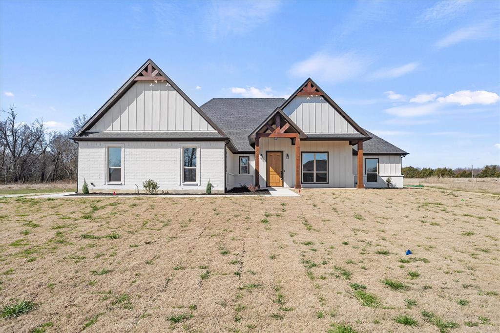 1-2-10 Builders Warranty included. Beautiful new construction on modern farmhouse in Celeste offering peaceful country living with stylish finishes throughout. The open-concept design features vaulted ceilings, abundant natural light, wood flooring, and a sleek linear fireplace. The kitchen includes a large quartz island, custom cabinetry, designer lighting, farmhouse sink, pot filler, and walk-in pantry—perfect for entertaining and daily living. The private primary suite features a spa-inspired bath with dual vanities, freestanding soaking tub, oversized walk-in shower, and walk-in closet. Secondary bedrooms and a dedicated office provide flexible living space. Enjoy expansive countryside views from the covered back patio with outdoor prep area and sink. Modern comfort meets quiet rural charm just minutes from town amenities. NO HOA. Oversized garage and HUGE closets and pantry.