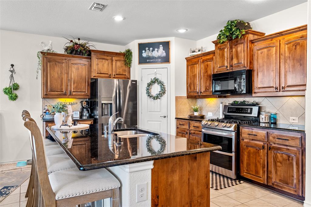 Step into a complete upgraded home at 1737 Kachina Lodge. This home nestled in a great location in Fort Worth offers the perfect blend of comfort, style and thoughtful modern living. This accommodating home shows seller pride from the moment you arrive. You will immediately notice attention to detail with updated flooring, abundant natural light with oversized newer windows, warm and inviting atmosphere designed for both everyday living and effortless entertaining. This 3 bed 2 bath also have a 4th bedroom or office space. This beautifully upgraded kitchen has a gas range while the spacious living areas flow seamlessly into the backyard retreat. Step outside to enjoy the amazing landscape and newly added pergola which is an ideal space for morning coffee, evening gatherings and the perfect Texas sunset! Upgrades are new flooring in home, new paint, new fixtures throughout home, mini safe in kitchen pantry, water softener, water sprinkler on timer and controlled by app. Smith Thompson, Home security system, extensive landscape, new back fence, new pergola, oversized windows in living room, insulated garage doors, blown insulation in attic and newer appliances. This home is located 20 min from downtown Fort Worth, great shopping and restaurants at the Alliance Presidio corridor and so many parks and walking trails to enjoy. Don't miss this home with so many more upgrades. THIS IS A MUST SEE