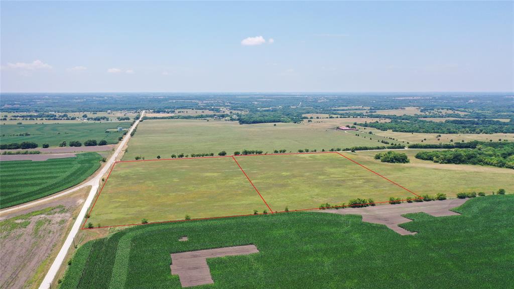 TRACT 2 of 2. This is an amazing property for someone looking for a place to build their dream home or looking for a buy and hold investment property. This property has other potential as well.  One will find approximately 617' of frontage on One Mile Lane. It is located just a short drive to US Highway 69 giving access to the growing cities of Sherman, Denison, and the new expanding Texas Instruments. There is currently an agriculture tax exemption on the property with the present tenant farmer in place using the property for hay production. Restrictions; no mobile home. Tract 1 is 14 acres, which lays due south of Tract 2. MLS number for TRACT 1 is 20351063.