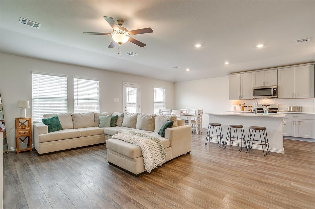 $10k YOUR way either off the price, seller credit towards buyers closings costs, or towards an interest rate buy buy-down. Welcome to 3013 Brittlebush Dr in Palmilla Springs a clean, bright, and thoughtfully designed Meritage home that offers easy living in one of Fort Worth’s growing communities. Built in 2023, this energy-efficient SPRAY FOAM INSULATED home combines modern finishes, functional spaces, and a convenient location just minutes from downtown Fort Worth. The open-concept layout centers around a spacious kitchen with a large island overlooking the main living and dining areas, making it ideal for everyday living and entertaining alike. Features include quartz countertops, stylish pebble-toned cabinetry, durable EVP flooring, and a private primary suite with an oversized walk-in shower and generous closet space. Outside, enjoy a massive backyard with plenty of room to relax, play, or entertain. Palmilla Springs residents also enjoy neighborhood walking trails, playgrounds, and a dog park woven throughout the community. Conveniently located near I-30 with quick access to shopping, dining, and entertainment, plus walking distance to Uplift Elevate Preparatory, this move-in ready home offers the perfect blend of comfort, style, and accessibility. Average monthly electric bill is only $90!