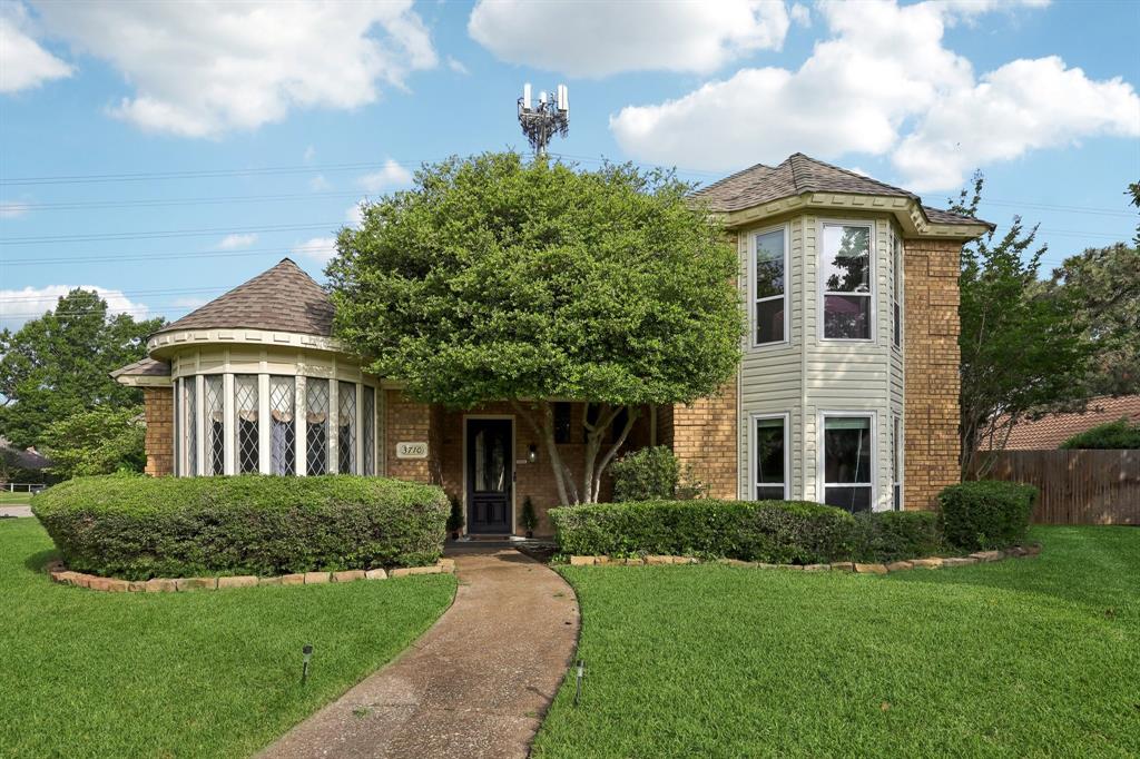 Custom home near Lake Arlington blending warmth, character, and exceptional entertaining spaces. This updated 4-bedroom, 3.5-bath home offers soaring ceilings with extras like crown moulding, custom wood accents, and abundant natural light throughout. The spacious main living area features a cozy gas fireplace, bar, and seamless flow into the sun-filled second living space with skylights and walls of windows overlooking the saltwater pool and yard. The updated kitchen is designed for gathering with a open concept, bay windows, plus generous prep and storage space. Flexible layout includes the private primary suite and an additional bedroom downstairs, while upstairs offers two secondary bedrooms connected by a Jack-and-Jill bath plus a loft-library area with custom built-ins overlooking the main level. Enjoy two dining areas, two gas fireplaces, and multiple indoor-outdoor entertaining spaces. Sellers have recently upgraded the home with solar panels, updated electric panel with grounding, a whole home surge protector and EV charger.  Windows and garage door plus motor, water heater, carpet and more have been updated recently.  Located in a sought-after neighborhood with active HOA amenities and convenient access to Lake Arlington, shopping, dining, and major commuting routes.