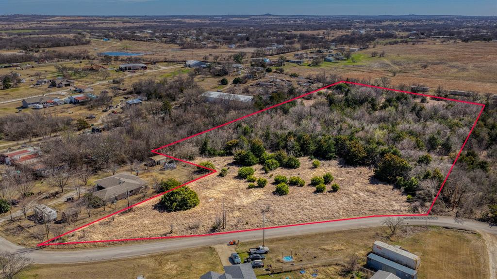 Discover 8.64± secluded acres in Crowley, Texas, just minutes from Benbrook Lake and only 30 minutes from Fort Worth. This partially treed property features beautiful native grasses and offers the perfect blend of privacy and convenience. Whether you’re envisioning your dream homesite or creating a charming mini ranchette, this versatile 8.64± acre tract provides endless possibilities in a peaceful, country setting