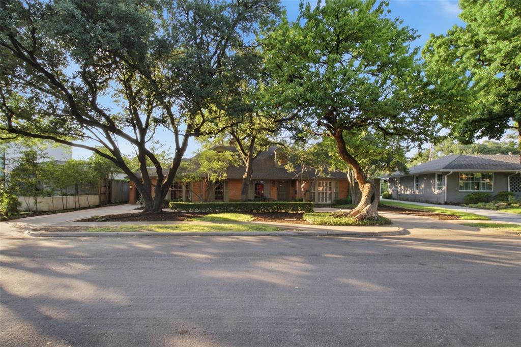 Located on sought-after Fairfax Avenue, just one block outside West Highland Park, this 4-bedroom, 4-bath home offers 3,449 square feet of living space on an 11,000-square-foot lot with mature trees and a circular drive. The home includes a formal living room, dining room, breakfast room, and a family room with vaulted ceilings. The family room features a fireplace, built-in cabinetry, built-in speakers, a wet bar, and several French doors overlooking the backyard. The kitchen includes a gas cooktop, large walk-in pantry, and a china and silver storage closet. The private primary suite is located in its own wing and features a sitting room, extensive built-ins, two walk-in closets, two separate primary bathrooms, and direct access to the 18' x 28' indoor pool room and private courtyard. Skylights throughout enhance the home's natural light, while a second-floor flex room provides additional storage. An exceptional opportunity to renovate and reimagine this home in a prime location, just minutes from the Dallas North Tollway, Highland Park Village, and Love Field. Estate sale. Property is being sold as is.