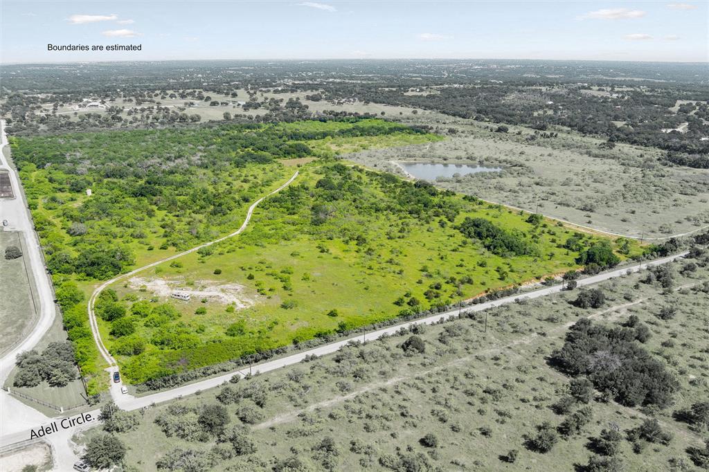 Approximately 85 acres are available for sale in northeast Parker County, presenting a great opportunity for ownership and development within the county or as a long-term investment. Historically utilized as an agricultural and recreational ranch, the property has four stock tanks, access to electricity, and approximately 1160 feet of road frontage along Adell Circle. Situated just off FM 1885, the property is conveniently located 20 minutes from Weatherford and 50 minutes from Fort Worth and the DFW Metroplex. Parker County continues to experience rapid growth, making this an expansive investment opportunity in North Texas. The property currently holds a Special Use Agricultural Evaluation or “Ag Exemption.” Schedule a showing today or contact the listing agent for further details.
