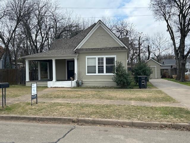 Cute 2 bedroom 2 bath home with a nice front porch and large backyard that would make a great starter or use as rental income.