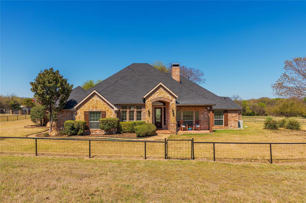 Experience refined country living on 11+ breathtaking acres in the heart of Anna, Texas. This exceptional ranch-style estate blends rustic charm with elevated comfort, offering serene views of rolling pastureland, a picturesque pond, and space for livestock—all under an agricultural exemption.

The main residence is a thoughtfully designed single-story home featuring 4 spacious bedrooms, 3 full baths, a dedicated study, and an elegant dining room—perfect for both everyday living and entertaining. Hand scraped hardwood floors and a beautiful stone fireplace provide warmth and elegance to the living spaces. Large windows frame the stunning landscape, bringing the beauty of the outdoors inside.   

Beyond the main home, the property is uniquely equipped for multi-generational living or guest accommodations. A well-appointed 2-bedroom, 2-bath guest house includes a full kitchen and laundry, while an additional two-level private office offers 2 office areas and 1.5 baths—ideal for work-from-home flexibility, or private retreats.

Equestrian enthusiasts will appreciate the barn complete with a 7-stall horse stable and additional garage space for farm or land equipment. With wide-open spaces, tranquil surroundings, and endless possibilities, this property delivers the perfect balance of peaceful country living and modern convenience.

Located within Anna ISD, this one-of-a-kind estate invites you to slow down, spread out, and enjoy the quiet beauty of Texas living at its finest.
Schedule your Showing Today!

Property is 11.1 Acres
Total Square Feet: 5,247 total
House: 2,803
Guest House: 1,344
Office: 1,100