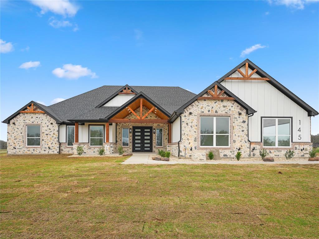 Welcome to 145 Cartwright Rd in Weatherford, where modern comfort meets peaceful country living. Situated on 2 acres, this beautifully built home offers 4 bedrooms, 3.5 bathrooms, a dedicated office, and 2,550 square feet of thoughtfully designed living space.

From the moment you arrive, the stone exterior, board-and-batten siding, and wood beam accents give the home a warm Texas feel and great curb appeal. Inside, the open layout creates a comfortable space for everyday living and entertaining, with plenty of natural light flowing through the main living areas.

The home features a spacious primary suite, along with a second primary bedroom, making it a great setup for guests, extended family, or multigenerational living. A private office provides the perfect spot to work from home or handle day-to-day tasks.

Step outside and enjoy the wide open 2 acre lot, offering plenty of room to add a shop, pool, or outdoor living space while still enjoying the quiet and privacy of country living.

If you're looking for a home that offers space, flexibility, and a peaceful setting just outside of town, this Weatherford property is one you won’t want to miss.