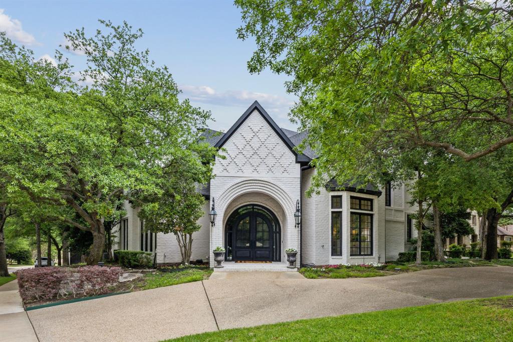 *Luxury Living in Shoal Creek–Private Corner Lot Estate* Nestled on a quiet corner, this hard to find fully renovated luxury home sits in a stunning 0.5-acre park-like setting with mature trees, rose bushes & a newly added 3-hole putting green. A circular driveway welcomes you to this entertainer’s dream, where no detail has been overlooked. Inside, enjoy soaring ceilings, marble countertops throughout, high-end light fixtures & custom designer finishes by IBB Interior Design. The expansive kitchen is a culinary dream w a built-in Miele refrigerator freezer, double ovens (including a European Ilve oven with custom brass-trimmed vent hood), additional oven in the butler’s pantry, two dishwashers, large marble island & walk-in pantry w coffee bar. The main level offers an updated, open concept floor plan along with a breakfast area, game room with an expanded bar area including a kegerator, wine fridge, ice maker & beverage fridge that flow seamlessly. Don't forget the large private guest suite w full bath, show stopping powder bath & dedicated office w double sided fireplace that passes through to the formal living area. Luxurious but practical, you'll love the spacious mudroom & laundry w built-ins. Panoramic 20-ft sliding doors lead to a backyard oasis w an oversized pool (new tile 2023, resurfaced 2024), an outdoor dining area, turfed pavers & two 9-ft raised flower beds with drip system, perfect for garden enthusiasts. The downstairs primary suite is a true retreat with a large sitting area, fireplace, massive walk-in closet, soaking tub, extra large shower & relaxing pool views. Upstairs, you'll find a spacious family room with an elevated reading nook perfect for sparking a child's imagination. With 3 additional guest rooms up, there is plenty of room for everyone whether you have a large family or frequent out of town guests. No expense was spared in designing this custom home. It is move-in ready and designed for luxury living and effortless entertaining!