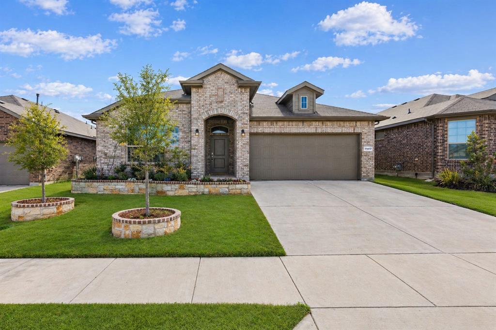 *LOWER PAYMENTS, GREAT AFFORDABILITY, SELLER PAID 2-1 RATE BUYDOWN!!!*NORTHWEST ISD!!*EXCEPTIONAL COMMUNITY AMENTITIES!!*OPEN-CONCEPT!!*
Welcome to this beautifully maintained 4-bedroom, 2-bath residence offering exceptional curb appeal and a welcoming entry that sets the tone from the moment you arrive.

Inside, a thoughtfully designed open-concept layout showcases modern recessed lighting and wood-look tile flooring throughout the main living areas. The light-filled living room creates an inviting atmosphere and flows seamlessly into the kitchen and dining spaces—ideal for both everyday living and effortless entertaining.

The kitchen is well-appointed with granite countertops, stainless steel appliances, a 5-burner gas range, subway tile backsplash, a large center island with breakfast bar seating, and a spacious walk-in pantry, delivering both style and functionality. The dining area is perfectly positioned with backyard views and direct access to the patio.

The private primary suite offers a spacious retreat, complete with an en-suite bath featuring a soaking garden tub, separate walk-in shower, dual sinks, and a generous walk-in closet.

Secondary bedrooms are well-sized and versatile, while a dedicated office nook with a built-in desk just off the kitchen adds convenience for working from home or managing daily tasks.

Step outside to a covered patio overlooking a spacious, private backyard—perfect for relaxing, entertaining, or enjoying outdoor living.

Located in the highly sought-after Northwest ISD and just minutes from Hwy 287, shopping, dining, and entertainment. Residents enjoy access to community amenities including a pool, park, playground, and walking trails.
