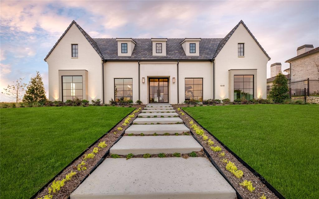 Welcome to the epitome of luxury living in the gated community Montrachet. An exquisite new construction presented by Olerio Homes on a half-acre lot, offering both privacy and opulence. This stunning home boasts unrivaled craftsmanship and attention to detail, with a tasteful blend of premier brick and cast stone architecture. White oak flooring guides you through out the open living floor plan into the heart of this home featuring a kitchen adorned with marble and quartz countertops, complemented by top-tier Sub-Zero and Wolf stainless steel appliances and an additional prep kitchen. With 5 ensuite bedrooms, designed for comfortable living and privacy. The primary suite is a haven, offering a serene escape, lavish design and high-end finishes. Showcasing beautiful curb appeal, a 3-car garage, huge backyard w private patio and phantom screens, this home is more than just a residence; it's a statement of refinement. Embrace the finest of luxury living in every detail.  Welcome home!