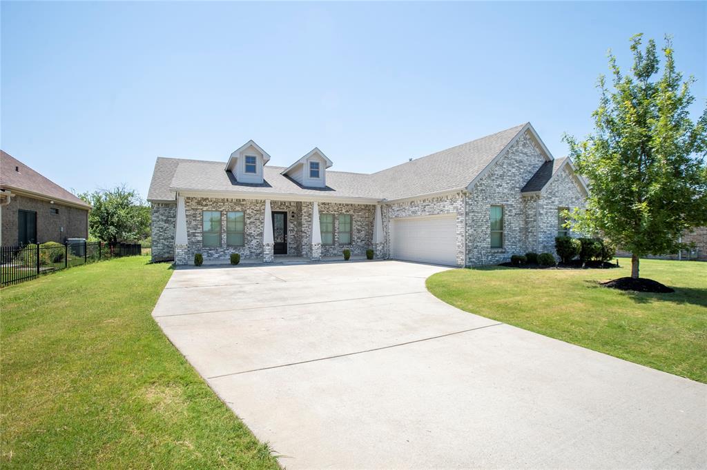 A unique opportunity to own a move-in-ready, custom-built home in a sought-after, gated-community just 30 minutes from Dallas! Welcome home to this functional 4 bedroom ,2.5 bath layout, along with an additional office-study for a great work-from-home option!  This open floor plan has an eat-in kitchen also featuring a large island, gas stove for cooking, self-closing cabinets with stainless steel appliances.  The master bedroom has beautiful tray ceilings with recessed lighting. Its ensuit bathroom has dual sinks, a stand-alone soaker tub with separate shower and a generous closet space with built-ins. Bedrooms are arranged in split layout for maximum privacy and all have walk-in closets for plenty of storage! This is a quiet, tight-knit community where houses rarely come available. All brick exterior and quality construction make this stand-out home extremely desirable!