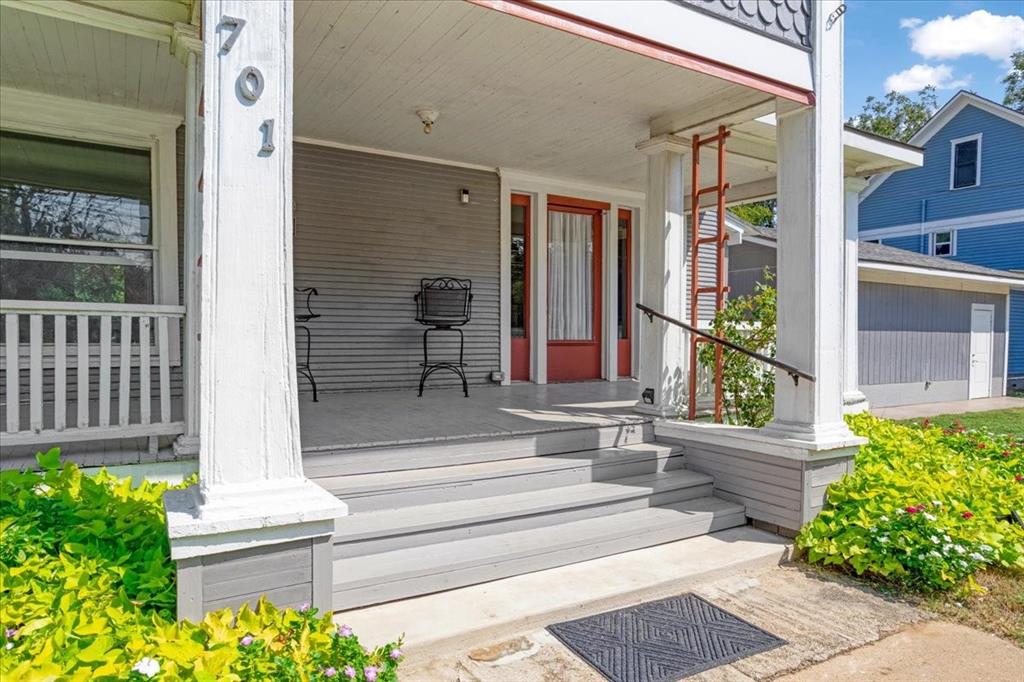 Some homes invite you to slow down the moment you arrive. This Victorian era residence built circa 1900, set along historic East Main Street in Whitesboro, does exactly that. From the wide front porch to the warmth of original woodwork inside, this home carries a sense of calm, character, and permanence that modern construction simply cannot replicate.

Inside, tall ceilings, hardwood floors, and original pocket doors create spaces that feel open yet grounded, designed for both connection and quiet retreat. Natural light moves easily through the home, and the upstairs sunroom offers a peaceful place to read, work, or enjoy a slower morning rhythm. With three bedrooms and two bathrooms, the layout feels livable and intuitive, balancing shared gathering spaces with privacy where it matters.

Beyond its charm, this home offers flexibility for real life. A private studio suite with kitchenette and full bath provides options that adapt as needs change, whether for multigenerational living, long term guests, a creative studio, or a dedicated home office or small business space.

Equally important, this historic home has been thoughtfully cared for. Recent evaluations and completed repairs focused on safety, moisture management, mechanical function, and everyday reliability, offering peace of mind to buyers who appreciate character while also valuing responsible ownership. This is a home that has been maintained with intention.

The location completes the experience. East Main Street places you just minutes from downtown Whitesboro shops, dining, schools, and community events, offering walkability and connection while still feeling residential and rooted.

This is not a home that rushes you. It is one that meets you where you are, offering history, flexibility, and a sense of place that feels both enduring and welcoming.