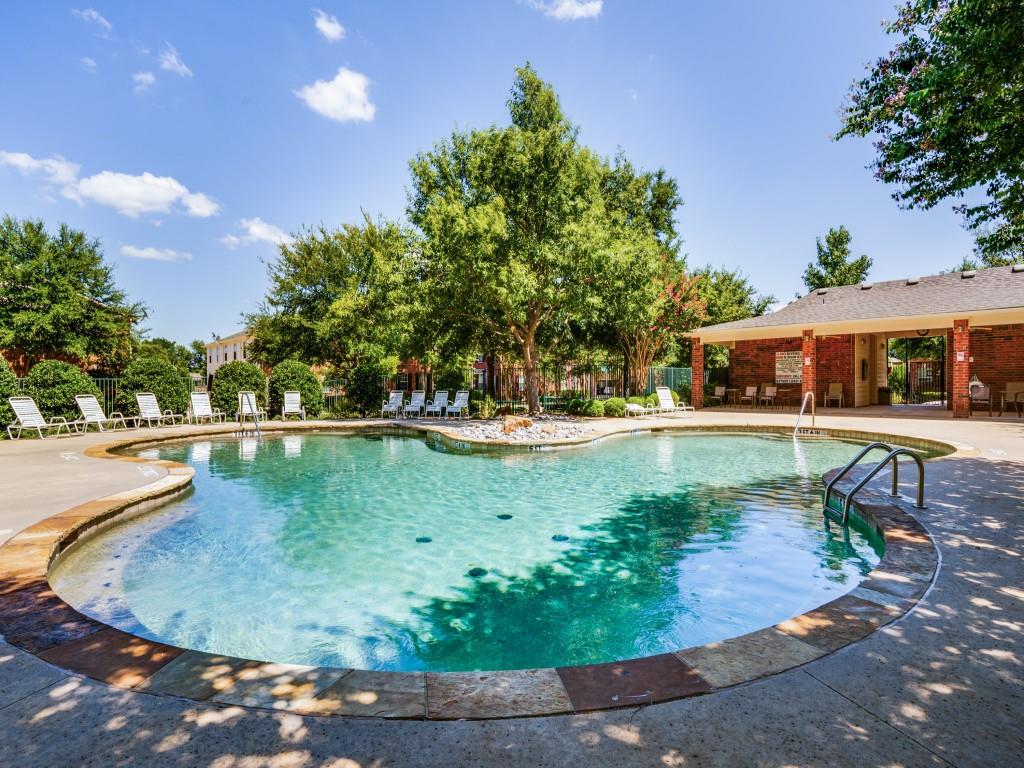 Step into style and simplicity in this beautifully updated end-unit Pasquinelli townhome located in a highly sought-after North McKinney community. Offering a true lock-and-leave lifestyle, this charming residence blends contemporary finishes with peaceful surroundings and exceptional privacy.

Over $75,000 in thoughtful upgrades have transformed this home into a move-in-ready retreat. Enjoy designer luxury vinyl wood-tile flooring, updated lighting and recessed fixtures, fresh interior paint, elegant Plantation shutters, custom Elfa closet systems, and new interior doors throughout. Plush carpeting adds comfort in the spacious bedroom suites.

The open-concept layout features two generously sized bedrooms, each with its own ensuite bath, ideal for guests, roommates, or a private home office setup. The expansive primary suite easily accommodates large furnishings and offers a spa-inspired bath complete with a deep soaking tub and separate walk-in shower with rain-head fixture.

The inviting kitchen is both functional and stylish, showcasing abundant cabinetry, updated appliances, a convenient coffee or breakfast bar, and seamless flow into the dining and living areas — perfect for entertaining or everyday living. The secondary bath has also been tastefully updated.

Additional highlights include wrought-iron banisters, a textured floor in the oversized garage and a new water heater. Even better, the KitchenAid stainless refrigerator conveys, making this exceptional home truly turnkey.

Market Street and Kroger grocery stores are within a mile, several restaurants, Benny's Bagels and Handel's Ice Cream!  All within a short driving distance!  You'll love the daily drive down shaded Virginia Parkway to Lake Forest where this development is located.  It's peaceful and perfectly located!