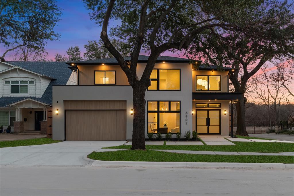 Extremely rare golf course lot on the 4th fairway of the prestigious Lakewood Country Club, offering unobstructed views and stunning Dallas sunsets. Golden hour becomes a daily ritual from the expansive veranda and oversized balconies overlooking the course. White oak hardwood floors and warm, earthy tones create a refined and cozy home. The gourmet kitchen is a standout, featuring hand-built cabinetry, Calacatta Dulce Vita quartz countertops, WOLF® dual-fuel range, 48-inch built-in Café® refrigerator, antiqued glass and white oak dry bar with backlit shelves and beverage cooler, plus a walk-in pantry with grocery pass-through. With six bedrooms, the home easily accommodates families, guests, or multi-generational living, including a junior primary suite in addition to the secluded main primary retreat with amazing views, white Carrera Marble, white oak, vessel tub and spacious rainfall shower. Color-drenched powder bath with Rosso Alicante marble vanity and Terrazzo floors as well as a statement piece guest bedroom or office. Built for performance and peace of mind, the home includes a Control4® Smart Home system, Anderson windows, CAT-6 pre-wiring, foam insulation, dual tankless water heaters, a piered-slab foundation, and a Maverick® 1-2-10 Builder’s Warranty—an exceptional opportunity for refined golf-course living in Lakewood.