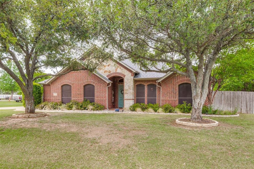 Set on over an acre within Mansfield ISD, this beautifully maintained home offers space, flexibility, and true move-in-ready appeal with fresh paint and newer carpet throughout. The inviting curb appeal is enhanced by a side-entry garage and additional parking, all with the added benefit of no HOA.

Inside, the open-concept kitchen is designed for both everyday living and entertaining, featuring granite countertops, stainless steel appliances, a gas range, and an oversized breakfast bar that flows seamlessly into the main living area. The private primary suite is thoughtfully split from the secondary bedrooms, creating a quiet retreat.

Just off the entry, a versatile second living space provides the perfect option for a formal dining area, home office, or additional sitting room. Outdoors, the property truly shines with a spacious backyard designed for relaxation and entertaining. Enjoy the newer swimming pool complete with a tanning ledge and built-in seating area with table, ideal for soaking up the sun or cooling off. A covered patio and extended open patio slab, along with a generous decking area, offer plenty of room for outdoor living and gatherings.

Located in a quiet neighborhood, this property combines comfort, functionality, and outdoor enjoyment in one exceptional setting.