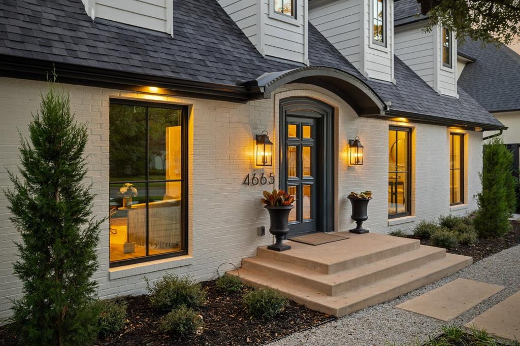 Experience the epitome of modern sophistication and luxurious living in the highly sought-after town of Highland Park, Texas. This special home has been lovingly restored with stylish and contemporary interiors that perfectly balance original features with modern amenities and seamlessly merges classic architecture with contemporary design. Inviting and versatile open floor plan and light-filled interiors create an ambiance of warmth and comfort throughout the home. High ceilings enhance the sense of spaciousness and oversized windows invite abundant natural light. The living room has vaulted ceilings, a fireplace, panel molded walls, and a bespoke color palette giving it a sophisticated and luxurious character. The built-in pocket doors provide additional privacy making this space a great option for an elegant and private study or home office. The spacious main living area has floor to ceiling windows and features a sculptural fireplace and opens to the dinning and kitchen area making it perfect for relaxed living and entertaining. A hallway gallery provides more entraining and art display space and features a custom folding glass door that can completely open the space to the landscaped backyard. The gourmet kitchen serves as the heart of the home with its custom white oak cabinets and top of the line professional-grade appliances. The oversize kitchen island has plenty of room to prepare meals, entertain, or just gather with friends and family.  This culinary haven is sure to inspire your inner chef. Two bedrooms are conveniently located on the first floor including the owner's suite, offering privacy and easy accessibility. Upstairs, two more bedrooms and an additional living area, that could be an office space, media room or exercise room depending  needs.This very special home was remodeled to the highest and latest standards of new construction. Discover exceptional living where modern luxury meets timeless elegance in an enviable location.