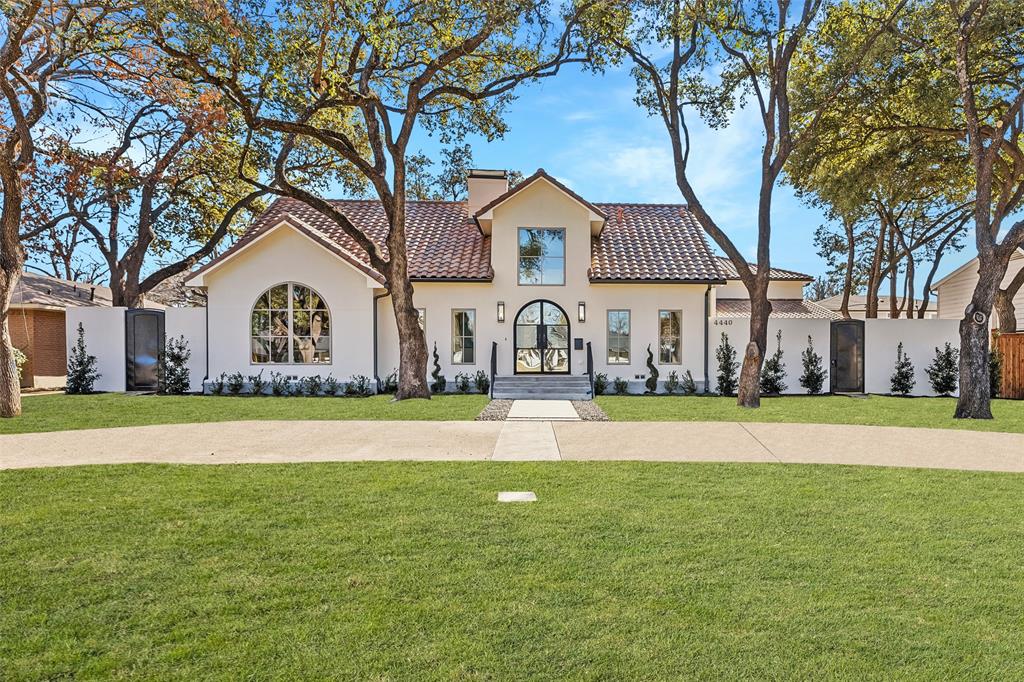 Located in the highly sought-after private school corridor, this charming & beautifully updated
home perfectly balances comfort, style, & modern living. From the moment you step inside,
you will notice the attention to detail through the thoughtful and high-end design selections. The
spacious great room boasts soaring two-story ceilings, elegant paneled walls, and a cozy gas log
fireplace, creating a warm and sophisticated ambiance. The kitchen is a chef's;s dream, featuring
high-end AGA and Fisher-Paykel appliances, Taj Mahal quartzite countertops, sleek modern
cabinetry, and abundant storage. Adjacent to the kitchen is a spacious dining area flooded with
natural light from walls of windows, making it perfect for entertaining. A well-appointed bar
elevates the hosting experience, complete with a beverage drawer refrigerator, wine fridge,
Viking icemaker, and dishwasher drawers. The downstairs primary suite offers a tranquil
courtyard view, dual walk-in closets, and a spa-like bathroom with a soaking tub, separate
shower, dual vanities and dual water closets. The main level also includes a private guest suite, a
dedicated study with built-ins, and a generously sized laundry room, creating a functional and
well-thought-out layout. Upstairs, you will find three private bedrooms, each with its own en-suite
bathroom and walk-in closet. An additional living space, a powder bathroom, and a balcony
overlooking the lush backyard complete the upper level. Outside, the backyard offers a serene
oasis with ample space for outdoor dining, an 8-foot privacy fence, and plenty of room to add a
pool. An additional courtyard off the kitchen provides even more outdoor space for relaxation or
entertaining. Parking is a breeze with a private two-car garage and a convenient circular
driveway.