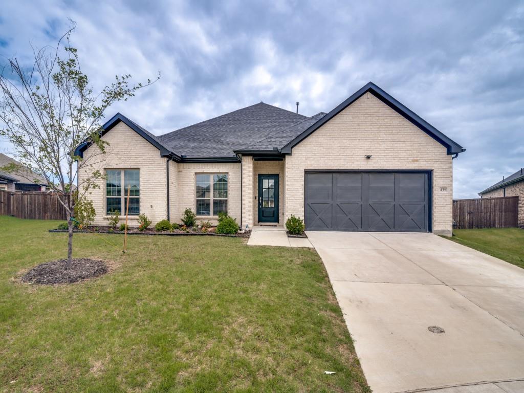 Unique opportunity on rare, oversized lot in the coveted Lakepointe community! The beautifully designed home greets you with an inviting entryway with soaring ceilings, abundant natural light and durable vinyl plan flooring flowing throughout the main living areas. Built for style, comfort and convenience, this thoughtfully laid out open-concept floorplan offers expansive living, dining and kitchen spaces that are perfect for entertaining and everyday living.  Kitchen features crisp white cabinetry, stainless steel appliances, plentiful storage and a large center island with seating, all overlooking the spacious family and dining rooms. Retreat to the primary suite sanctuary, complete with a spa-like bathroom with dual sinks, ample storage, and a massive walk-in closet. Three additional generous bedrooms all feature sizable walk-in closets. Oversized utility and mud room positioned off the garage for effortless daily transitions. Create your own backyard oasis in one of the largest lots in the community with unparalleled privacy. Prime location just minutes from shopping, dining and top-rated schools, don't miss the chance to call this modern ranch-style home yours!
