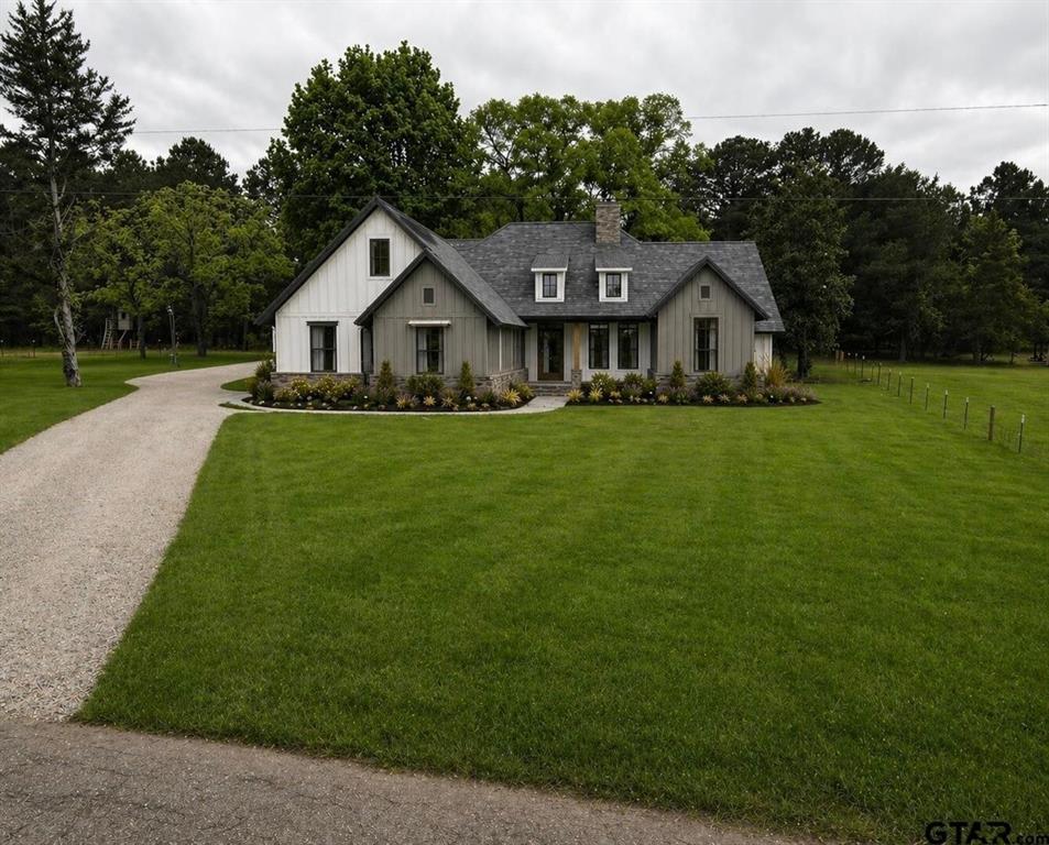 Experience the perfect blend of luxury, functionality, and country living in this stunning new construction home by A Henson Home. Designed with a desirable split-bedroom layout, this spacious floor plan offers 4 to 5 bedrooms, 3.5 bathrooms, and thoughtful details throughout. The primary suite is a true retreat, featuring separate vanities, a freestanding soaking tub, and a generous walk-in closet with direct access to the laundry room for added convenience. The home will showcase numerous upgrades, including built-in cabinetry, beautiful stone countertops, elegant lighting fixtures, and quality finishes throughout. Additional storage is made easy with full-size stairs located in the garage, providing convenient access to a large upstairs storage area. Situated on nearly 1.4 acres outside the city limits, this property offers privacy, mature trees, and plenty of room to create your dream homestead while still enjoying the comforts of a modern, thoughtfully designed home. Expected for completion in Q1 2027, buyers who secure an early contract will have the exciting opportunity to make select design and finish selections, allowing them to personalize the home to fit their style and preferences. Don't miss the opportunity to make this exceptional property your own!
