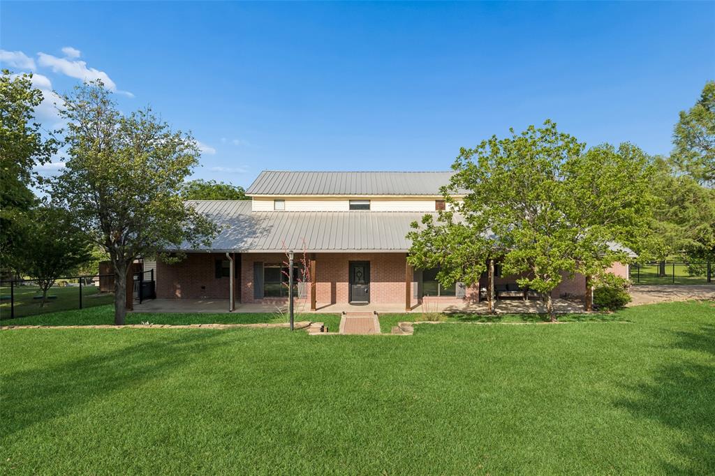 Seller preferred lender offering a 2-1 rate buy down with acceptable offer. Contact listing agent 2 for lender contact info. Located in the highly sought-after Aledo Independent School District, this stunning two-story home in Remuda Ranch Estates offers the perfect blend of peaceful country living and modern-day convenience. Nestled on a quiet cul-de-sac and situated on an expansive 1.58-acre lot, this property provides the space, privacy, and freedom you’ve been looking for. A Texas-sized front porch stretches across the front, inviting peaceful mornings in rocking chairs and golden-hour sunsets overlooking charming cactus-inspired landscaping. Boasting 4 bedrooms and 3.5 baths, the home welcomes you with a beautiful entry and rich hardwood floors. The spacious living room features a charming wood-burning fireplace, creating a warm and inviting atmosphere. A large, elegant library or private office with built-in cabinetry and shelving offers the ideal space for working from home or studying in comfort. The oversized kitchen is designed to impress, complete with a large island and abundant cabinetry, perfect for entertaining or bringing out the inner chef in anyone. The first-floor primary suite is a true retreat, highlighted by an elegant bathroom with a large glass-door shower. The true beauty of this home is the land. With 1.58 acres, you have endless possibilities, room to play, entertain, build, or simply enjoy the open space and tranquility. Upstairs, you’ll find two spacious guest suites, each complete with a private en-suite bath and generous walk-in closet plus a third guest bedroom. While you’ll enjoy the peace and quiet of country living, you’re still conveniently close to city amenities.  Move-in ready and located in one of the most desirable school districts in the area, this exceptional property offers space, comfort, and lifestyle all in one. Act quickly, homes like this don’t last long.