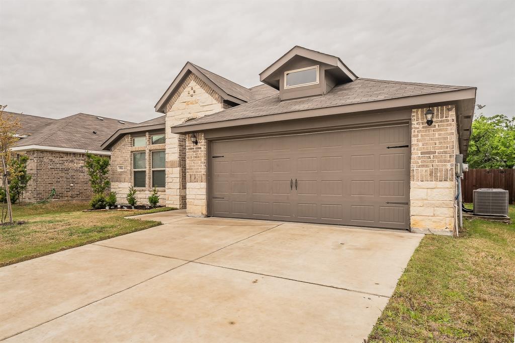 BETTER THAN NEW! Luxury tile flooring, motorized blinds, security system, completed landscaping, and special financing available for qualified buyers. Skip the builder upgrades and move right in. This 2023-built, 3-bedroom, 2-bath home offers 1,861 square feet of open-concept living in an established section of the community with no nearby construction. Conveniently located near Chisholm Trail Parkway, shopping, dining, and local schools.