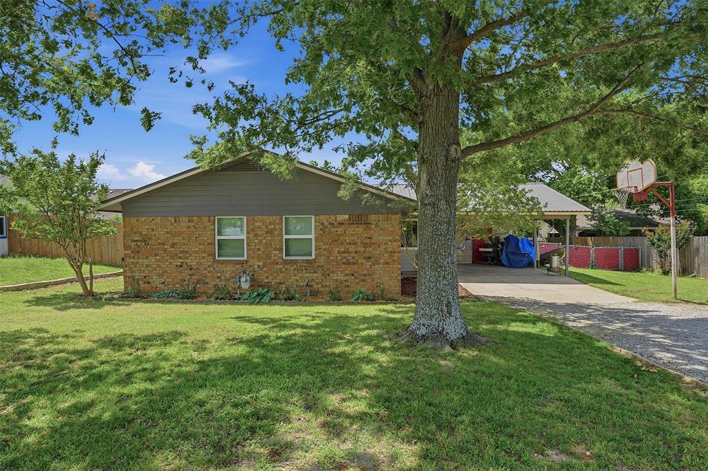 Charming home in the heart of Gunter offering small-town living with room to enjoy the outdoors. Situated on an oversized lot with mature trees and a large backyard, this property features a covered front porch, attached carport, and plenty of space for entertaining, gardening, or future possibilities. Inside, you’ll find a functional layout with comfortable living areas, eat-in kitchen, and updates that make the home move-in ready. Conveniently located near schools, downtown Gunter, and just minutes from the rapid growth happening throughout the area. Great opportunity for first-time buyers, investors, or anyone looking for affordable living in one of North Texas’ fastest-growing communities