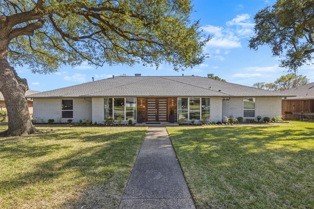 Discover this fully updated single-story home in the desirable Richardson ISD, where modern design meets everyday comfort. Inside, hand-scraped hardwood flooring flows through the main living spaces, adding warmth and character while tying the home together beautifully.  The layout is open and inviting, designed to keep everyone connected. The kitchen serves as the centerpiece, featuring sleek quartz countertops, stylish cabinetry, a commercial-grade 6-burner gas cooktop, and a large island that’s perfect for cooking, gathering, or casual dining.  The main living area offers a comfortable space to relax, highlighted by a contemporary gas fireplace, while a separate living room provides additional flexibility for entertaining or quiet time.  The primary suite is thoughtfully designed with two closets, direct access to the backyard pool, and a well-appointed ensuite bath with dual sinks, quartz counters, and a spacious glass walk-in shower.  Two secondary bedrooms each include their own private bathrooms, offering convenience and privacy, while a split fourth bedroom with a walk-in closet and nearby full bath works well as a guest room, office, or multi-purpose space.  Out back, enjoy a peaceful setting with a sparkling pool, generous deck space, and an automatic gate that extends the parking area—ideal for both relaxing and hosting. This home offers a great combination of location, updates, and livability.  Recent improvements include interior paint and carpet (2025), pool updates including plaster and tile (2024), foundation work (2024), PVC plumbing throughout (2024), and a roof replaced in 2019.  You don't want to miss out on this Luxury home