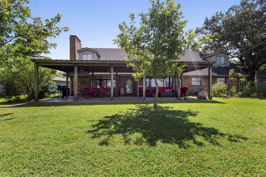 Lakefront 4BR Home with Private Dock, Game Room & Stunning Views! Discover the perfect family getaway with breathtaking 180° open water views of the lake! Nestled on a quiet cul-de-sac in Key Ranch Estates, this one-of-a-kind property is designed for making memories — from early morning fishing trips off your private dock to cozy evenings on the 900 sq. ft. covered porch watching the sunset together. With 4 spacious bedrooms, 3 full bathrooms, a huge game room, an oversized 2-car garage and storage shed,  there’s plenty of room for everyone — family gatherings and weekend guests. Enjoy peace of mind with major updates already done: a new roof (2024), new AC units (2022 & 2023), and a rebuilt boat dock (2024) with new poles, roof, and lift. Host family cookouts, spend lazy afternoons on the water, and enjoy front-row seats to the annual Fourth of July airshow — all from your own backyard. This is more than a lake house; it’s a place your family will treasure for generations. Furniture is negotiable.