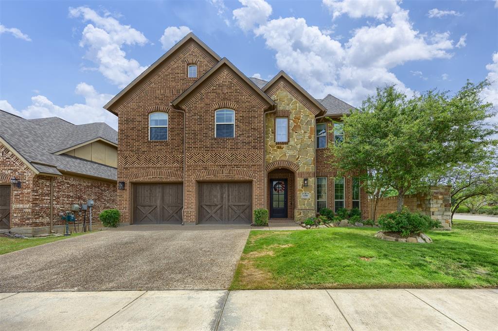 Situated in the heart of Lantana, this exceptional two-story home combines spacious living with thoughtful design and over $170,000 in carefully selected improvements. From the moment you step inside, you're welcomed by an inviting entryway and a private office enclosed by French doors, creating the perfect space for working from home or quiet study. The main living area is designed for gathering, featuring soaring ceilings, rich wood flooring, custom built-ins, and an open flow into the beautifully appointed kitchen. Complete with an oversized island, abundant cabinetry, and stainless steel appliances, the kitchen serves as the centerpiece of the home for everyday living and entertaining alike. The primary suite is conveniently located on the first floor and offers a spacious retreat with a beautifully designed bath and customized closet space. Upstairs, you'll find a generous game room, dedicated media room, and additional bedrooms that provide flexibility for a variety of lifestyles. Outside, enjoy a private backyard setting with mature landscaping, a covered patio, and an expansive deck area ideal for relaxing or entertaining. Additional highlights include a 2024 roof, Aquasana whole-home water filtration system, custom window treatments, designer lighting, built-in cabinetry throughout, and numerous thoughtfully curated details that enhance both comfort and functionality. This is a rare opportunity to own a truly distinctive home in one of Lantana's most desirable communities.