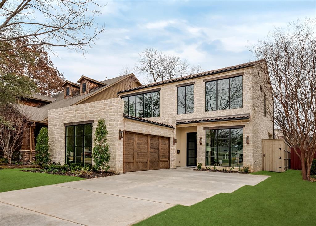 Developed by D Best luxury builder Alexander Hunt Distinct Homes, with designer interiors by Savvy House. Spanish Modern with hand cut stone + tile roof. Glass entry and panoramic floor to ceiling windows light up the great room and living spaces. Designer kitchen is focused around an oversized quartz island, Thermador appliances, walk-in pantry, and stunning temp-controlled glass wine room. Main floor suite is a lavish space with an oversized bedroom and sitting area. Spa bath has a freestanding tub, curb-less shower, double vanity, and secluded garden. 11-ft ceilings with sheetrock returns for a clean aesthetic throughout. Upstairs 40ft game room, wet bar, and 3 ensuite bedrooms with walk-in closets. Luxury Tile roof and limestone accents. Smart home, extensive pre wire, and Lutron lighting.