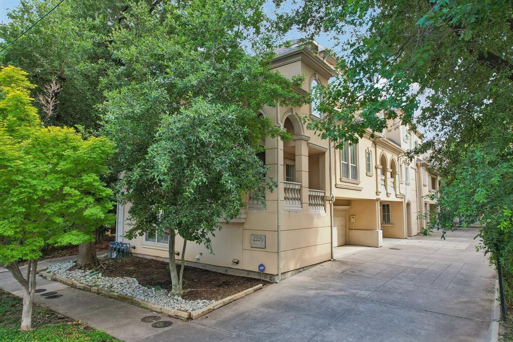 Tucked into the heart of Oak Lawn–Uptown Dallas, this one-of-a-kind boutique three-story Mediterranean corner-unit townhouse offers a rare opportunity to own a residence unlike any other in the community. Nestled within a private enclave of just four townhomes, each with a distinct floor plan, this home features two private en-suite bedrooms, a built-in bar, a butler’s pantry, dual balconies, and an attached two-car garage—offering the perfect balance of luxury and functionality. From the moment you step through the grand entryway, soaring ceilings and abundant natural light create an impressive sense of space. Hand-scraped hardwood floors flow throughout the home, while large windows frame mature trees on three sides, providing a peaceful retreat in the middle of the city. Designed for entertaining, the spacious kitchen features a generous breakfast bar, ample workspace, and a seamless connection to the living and dining areas. Ideally located just minutes from grocery stores, shopping, dining, entertainment, Turtle Creek, the Katy Trail, and with quick access to the Dallas North Tollway, this distinctive Uptown residence offers the perfect blend of privacy, comfort, and city living.