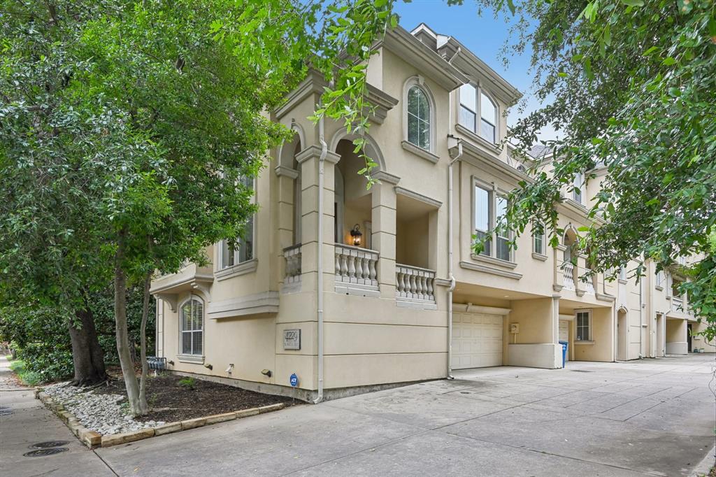 Tucked into the heart of Oak Lawn–Uptown Dallas, this one-of-a-kind boutique three-story Mediterranean corner-unit townhouse offers a rare opportunity to own a residence unlike any other in the community. Nestled within a private enclave of just four townhomes, each with a distinct floor plan, this home features two private en-suite bedrooms, a built-in bar, a butler’s pantry, dual balconies, and an attached two-car garage—offering the perfect balance of luxury and functionality. From the moment you step through the grand entryway, soaring ceilings and abundant natural light create an impressive sense of space. Hand-scraped hardwood floors flow throughout the home, while large windows frame mature trees on three sides, providing a peaceful retreat in the middle of the city. Designed for entertaining, the spacious kitchen features a generous breakfast bar, ample workspace, and a seamless connection to the living and dining areas. Ideally located just minutes from grocery stores, shopping, dining, entertainment, Turtle Creek, the Katy Trail, and with quick access to the Dallas North Tollway, this distinctive Uptown residence offers the perfect blend of privacy, comfort, and city living.