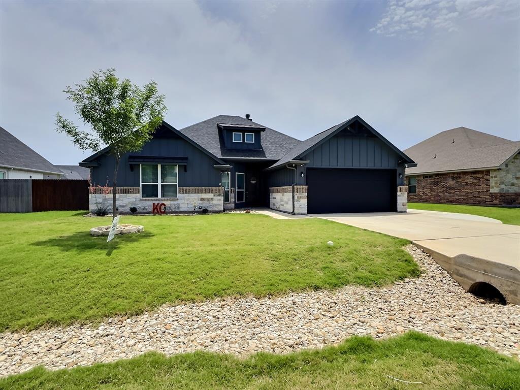 Welcome to this move-in ready, 2022-built gem in the sought-after Meander Estates neighborhood of Granbury! This beautifully maintained home features 4 spacious bedrooms and an open-concept layout where the kitchen flows seamlessly into the living and dining areas — perfect for entertaining or everyday living. Enjoy the added convenience of a whole-house central vacuum, an extended covered patio, an extended driveway, and an attached garage, all complemented by great curb appeal and generous yard space. With newer construction comes modern energy efficiency and low-maintenance peace of mind, plus an unbeatable location just minutes from shopping, dining, schools, and the charm of historic downtown Granbury. Schedule your tour today!