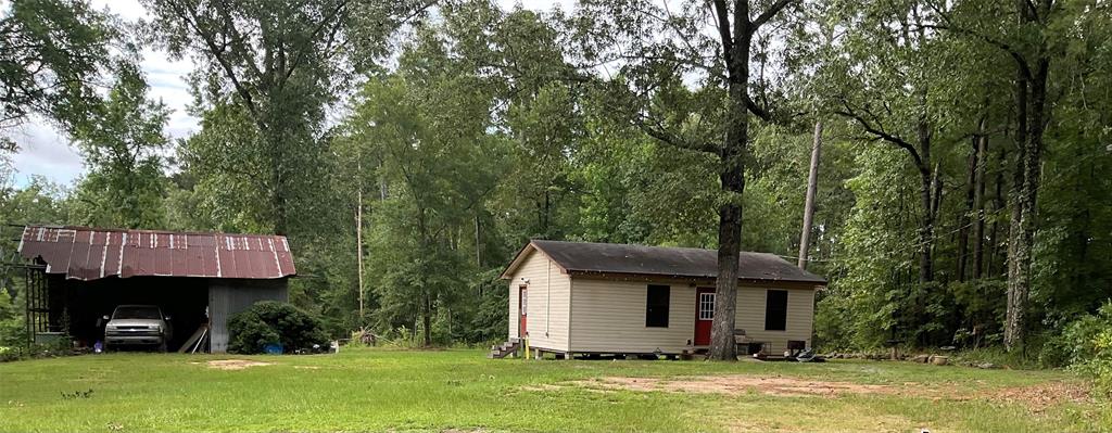 MAJOR NO PLAY PRICE DROP ON THIS ONE!!!!! PRICED TO SELL!!!!!! COME SEE THIS VERY LOVELY HOME!!!!Don't sleep on this little cutie! Cute, cozy, comfy and country living! Owners are working with Caddo Assessor's Office to get the correct land acreage (1.92) updated on the property report. Yes, owner reports this one sits on 1.92 acres of land. Home has been much loved and well taken care of. Beautiful floors throughout, crown molding in living room, kitchen and bedrooms! Updated bath and plenty of cabinets in the kitchen! Central heat and Air give this one an A+! Go and show and bring us a great offer! This one may qualify for 100% financing!  Rural Development Loan. Address check says yes but check it out for yourself! All information believed to be accurate but must be verified by Buyer and Buyer's Agent.