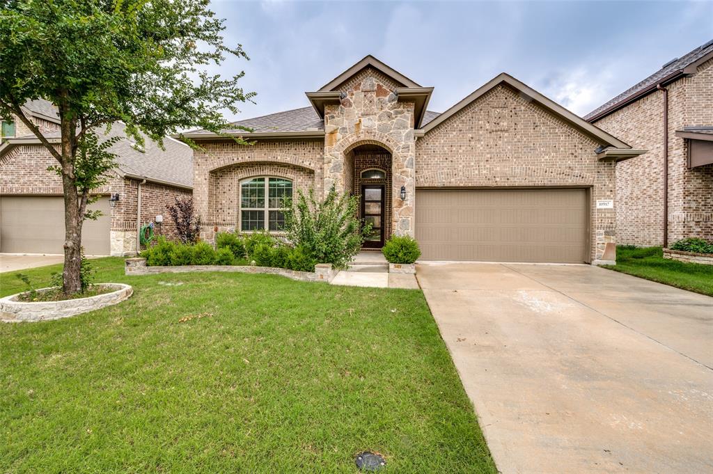 Welcome to your dream home in the coveted Highlands at Westridge! This NORTH-facing gem delivers the ultimate family lifestyle with WALKABLE access to all Prosper ISD schools—from elementary to high school—making morning routines a breeze. Step inside to an open-concept great room where gleaming hardwood floors, high ceilings, and a cozy fireplace wall create the perfect backdrop for making memories. The open kitchen is a showstopper with granite countertops, GAS cooktop, stainless appliances (yes, the FRIDGE stays!), and a TRENDY COFFEE BAR—plus that clever OFFICE NOOK off the kitchen makes work-from-home life seamless. The split-bedroom layout means parents get their peaceful retreat with dual sinks, soaking tub, and massive closet, while THREE secondary bedrooms offer plenty of space for the kids. Outside your door, dive into the community pool or let the little ones run wild at Prestwyck Park's splash pads and playgrounds. Perfectly positioned in the golden triangle of McKinney-Prosper-Frisco, you're minutes from gourmet dining, premier shopping, and even the PGA headquarters. This isn't just a house—it's your family's next chapter waiting to begin!