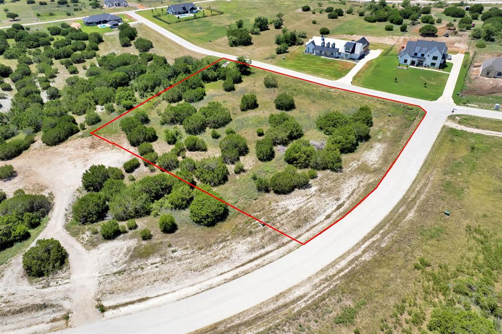 Discover the elevated lifestyle of Putteet Hill, a gated community where privacy, space, and natural beauty take center stage. Set among expansive 2+ acre homesites with durable concrete streets, residents enjoy exclusive access to a private, stocked lake—perfect for peaceful afternoons and weekend escapes. Ideally located just 5 miles from HEB, 2 miles from the Cresson Bypass, 17 miles to I-20, and only 9 miles from the vibrant, historic Granbury Square, this location offers the perfect balance of quiet living and everyday convenience.

Nestled in the growing town of Cresson, 400 Conway Cv is a standout opportunity to build your dream home, place a manufactured home, or invest in a high-potential area. With quick access to US-377 and the Chisholm Trail Parkway, commuting to Fort Worth, Granbury, and Weatherford is seamless. Surrounded by wide-open skies and gently rolling land, this versatile property invites you to create your vision while enjoying the space, freedom, and long-term value that make Putteet Hill a true hidden gem in North Texas.