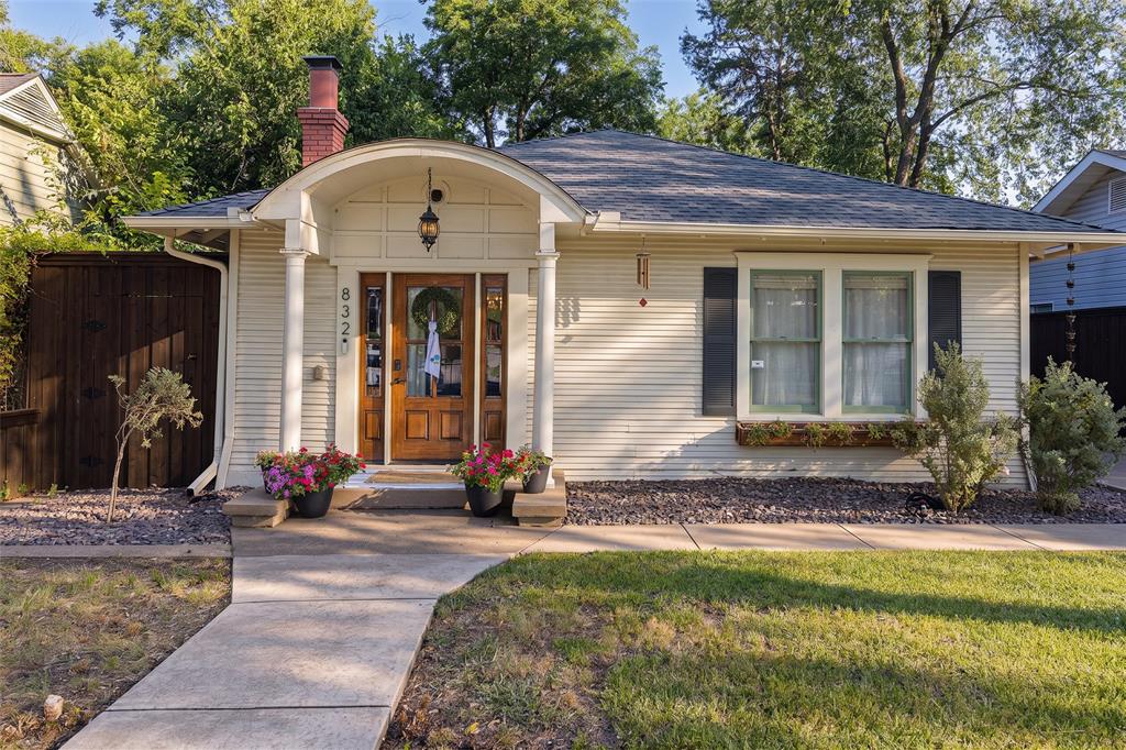 Step into a home that invites you to slow down and reconnect with what matters most. Built during a time when craftsmanship was an art and every detail was created with purpose, this historic Craftsman is a timeless reminder of simpler days. Thoughtfully updated for present-day living, it offers the rare opportunity to enjoy the warmth, character, and authenticity of yesterday while creating the memories of tomorrow. Nestled in the highly sought-after Kings Highway Conservation District, this beautifully updated 2-bedroom, 2-bath home showcases original hardwood floors, abundant natural light, and an inviting open-concept layout. The kitchen, the place for preparing meals, sharing stories and where family and friends will gather...flows effortlessly into the living and dining spaces. While just beyond, a charming sunlit nook offers the perfect place to sip your morning coffee, read a favorite book, or simply watch the sunrise as a new day begins. The spacious primary suite features a beautifully updated ensuite bath with double sinks, large walk in shower. Fully gated in both the front and backyard, the property provides exceptional privacy and outdoor spaces to entertain, garden, or simply unwind. The backyard retreat features lush, low-maintenance turf, a charming greenhouse, and a detached building with electricity—ideal to turn into a home office, art studio, fitness room, workshop, or creative space. Located just a short stroll or bike ride from the vibrant Bishop Arts District and scenic Kidd Springs Park, you'll enjoy one of North Oak Cliff's most desirable lifestyles, with award-winning restaurants, boutique shopping, coffee shops, walking trails, and community events just moments from your front door.