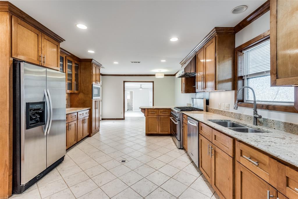 Welcome to 2012 Atlantic St, a well-located home in the desirable Stevens Park and Kessler Park area of Dallas, just minutes from Bishop Arts and a variety of shopping, dining, and entertainment options. This spacious 3-bedroom, 3-bath home features an open-concept layout connecting the kitchen, breakfast nook, dining, and living areas, creating a functional space ideal for both everyday living and entertaining. A large bonus room offers flexibility and can be used as a second living area, media room, or potential fourth bedroom. The property includes a generously sized backyard, a two-car garage, and a gated rear driveway providing secure parking and added privacy. Conveniently located just seconds from I-30 and within walking distance to Stevens Park Golf Course and nearby trails. Close proximity to recently developed retail, including Sprouts and other major convenience. Seller is offering up to $10,000 in buyer concessions with an acceptable offer, which may be applied toward closing costs or interest rate buy-down. This home offers a prime location with space and flexibility. Schedule your showing today