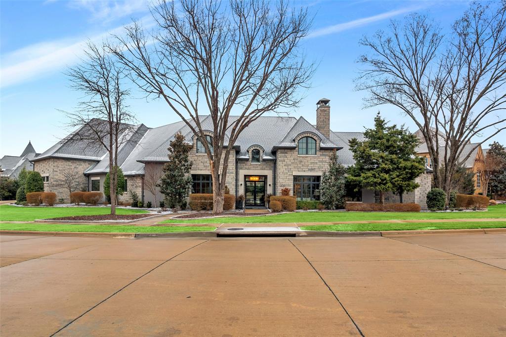 From its French Eclectic-style architecture and meticulously manicured grounds to its modern designed interiors, this estate dazzles inside and out. The clad steel and glass doors lead to a striking entry with gleaming select marble flooring, and a magnificent view through a cascading glass joint wall. European Walnut hardwood flooring with a smooth finish pair with decorative imported tile throughout. The spacious kitchen has been adorned with sleek stainless-steel appliances. In addition to a game room with a wet bar, theatre room, powder bath, and a guest bedroom with a fully en suite bath, the first floor houses the luxurious primary suite, where expansive east facing windows with flood the space with natural light. The amenities continue outside, where a resort-style pool and spa share space with a large terrace and ample room to entertain a crowd. There is also a separate guest house-cabana-art studio. You will all love this home for years to come.