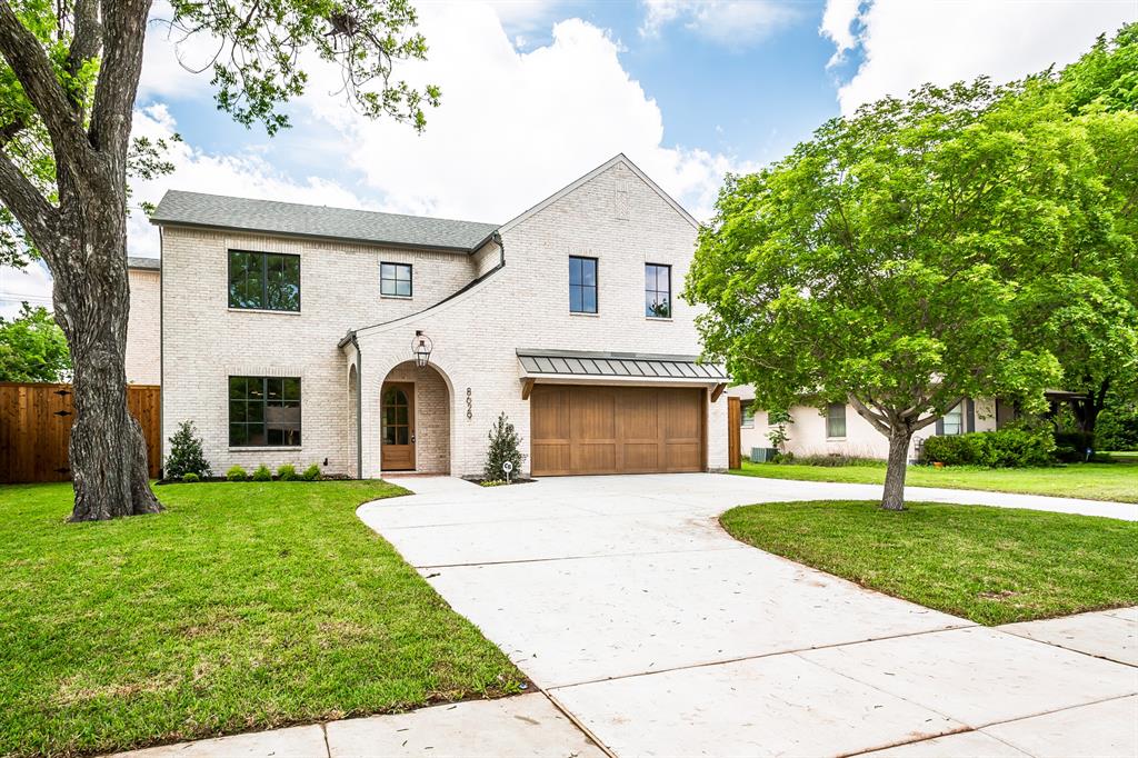 Located in highly sought-after Lake Highlands neighborhood, 8629 Lockhaven presents a rare opportunity to live in one of the city’s most desirable areas. Zoned to the acclaimed Lake Highlands Elementary and minutes from White Rock Lake, residents enjoy access to scenic walking and biking trails. The home is conveniently close to top-rated schools, dining, and entertainment—offering the perfect balance of location and lifestyle.
This stunning 4,110-square-foot home seamlessly blends modern design with everyday functionality. Arriving on its circular driveway, the beautifully crafted exterior is stunning.  Inside, an expansive open-concept layout filled with natural light from Pella windows, while custom ceiling arches elevate the main living space along with 12' ceilings. A marble-surround gas fireplace anchors the room, creating a warm and inviting focal point. A private first-floor study with glass doors provides a perfect work-from-home space, while the downstairs primary suite serves as a true retreat, featuring a high vaulted ceiling, freestanding soaking tub and elegant marble finishes throughout.
At the heart of the home, the chef’s kitchen impresses with luxurious marble countertops, a full-height stone backsplash, top-of-the-line KitchenAid appliances, and a dedicated prep area with a spacious walk-in pantry. Sliding glass doors seamlessly connect the living and kitchen areas to an outdoor grilling space, creating effortless indoor-outdoor living. The expansive backyard is equipped with a multi-zoned sprinkler system for easy maintenance.
Upstairs, a custom-designed game room features built-in entertainment cabinetry and a bar area, perfect for hosting. Three additional bedrooms complete the second level, each paired with bathrooms showcasing designer tile and high-end finishes.
With high end lighting, premium appliances, and thoughtfully curated designer touches throughout, this home offers a rare combination of elegance, comfort, and versatility.