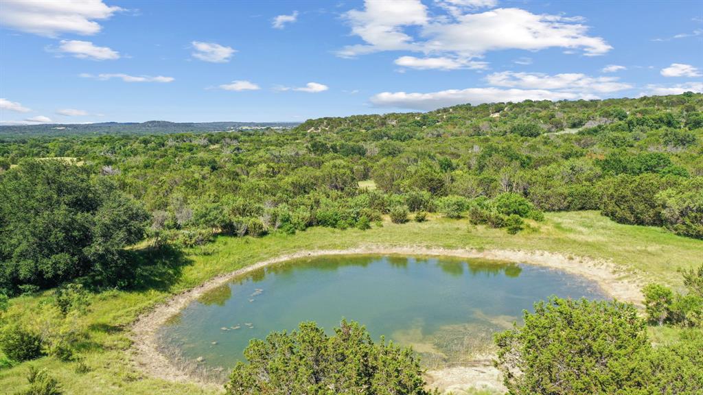 This elegant +- 295-acre property is located in Bluff Dale, TX. Situated conveniently just 3 miles from Hwy 377, 12 miles to Stephenville and Hwy 281, or 6 miles to Morgan Mill and Hwy 281, with Interstate 20 accessible within 16 miles. The property currently lacks improvements but has power available at the road. Owned by the same family since 1968, it is utilized primarily for hunting. This property is currently in the MLD program, focusing on maintaining exceptional white-tailed deer. Boasting abundant wildlife, extensive elevation changes, numerous trails, multiple potential homesites, and panoramic 360-degree views; this property will provide its new owners with countless opportunities.